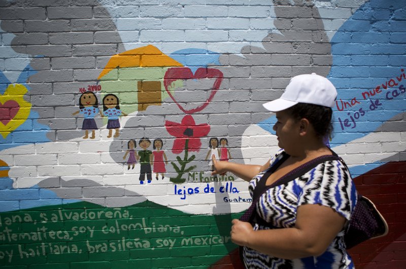 Migrants paint hopes and dreams on murals