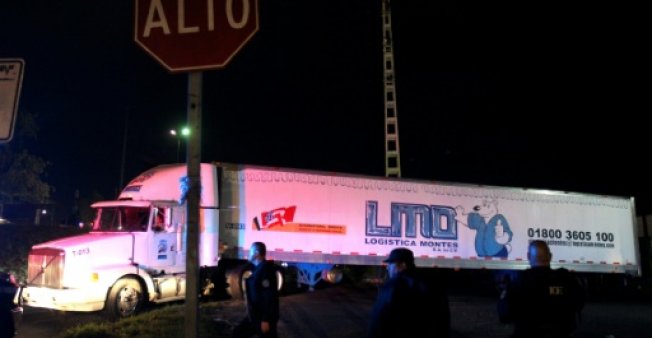 Mexico official fired over odyssey of truck with nearly 300 bodies