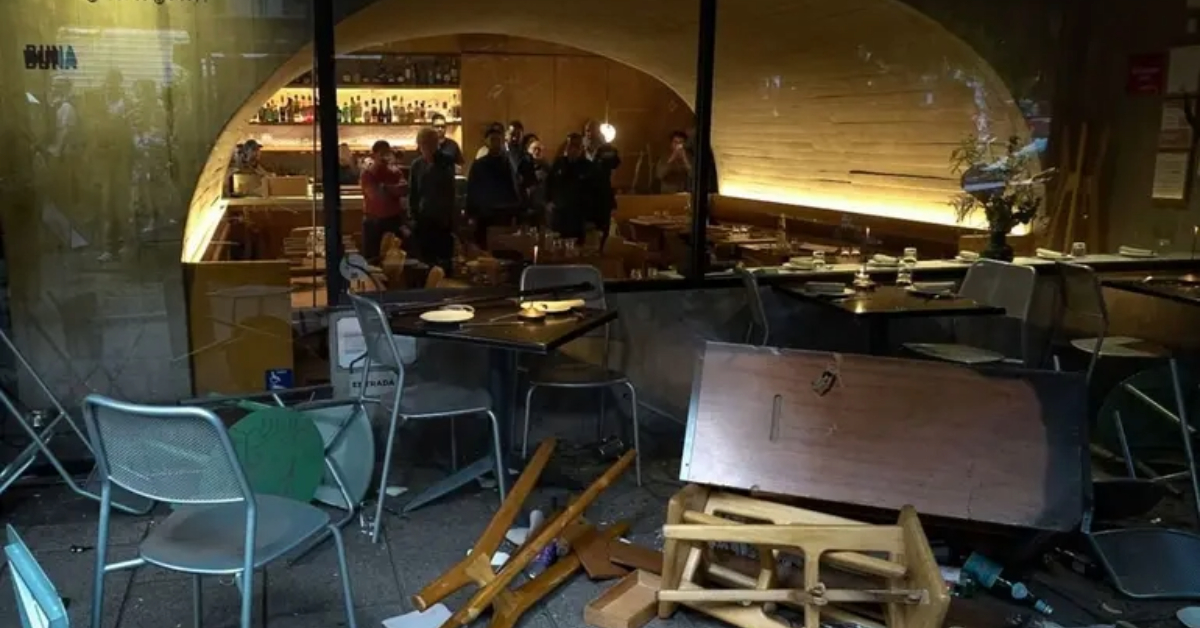 Protest graffiti and smashed windows mars anti-gentrification rally in Mexico City