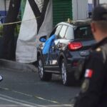 13 arrested in killing of two mexico city government workers