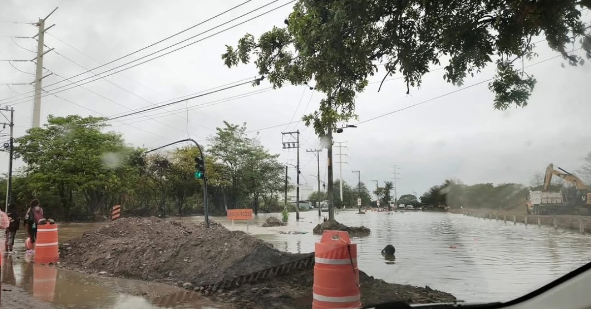 Do Not Cross Paso del Guayabo Officials Warn Drivers